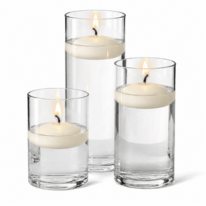1 of 14: Cylinder Vase Centerpiece & Richland 3" Floating Candles Set of 12