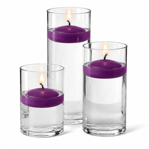 12 of 14: Cylinder Vase Centerpiece & Richland 3" Floating Candles Set of 12